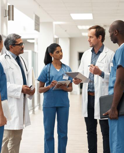 healthcare workers standing and talking