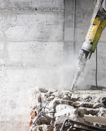 worker using a jackhammer