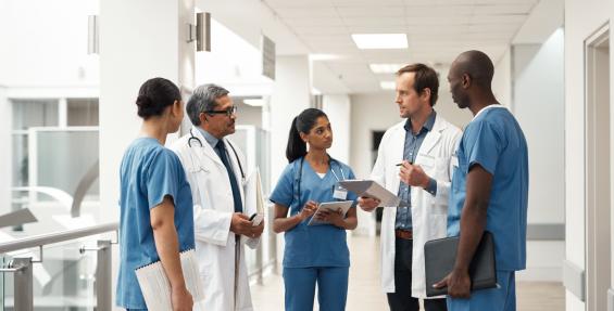 healthcare workers standing and talking